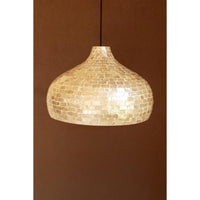 A dome-shaped pendant light shade made of small iridescent shell-like tiles, suspended against a solid brown background.