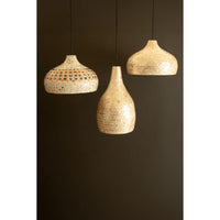 Three hanging pendant lights with textured mosaic shades in beige, cream, and light brown tones, suspended against a dark brown background.