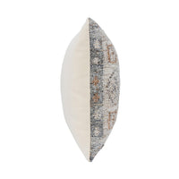 Side view of Classic Home Outdoor Performance Lukens Pillow with patterned front and solid cream back, on white background.