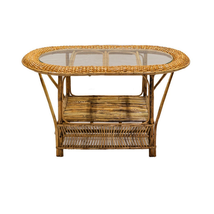 Wicker coffee table with glass top on a white background