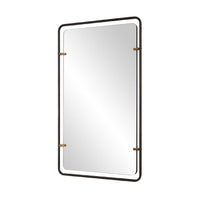 A rectangular wall mirror with a thin dark frame and small brass-toned corner brackets, shown against a plain white background.