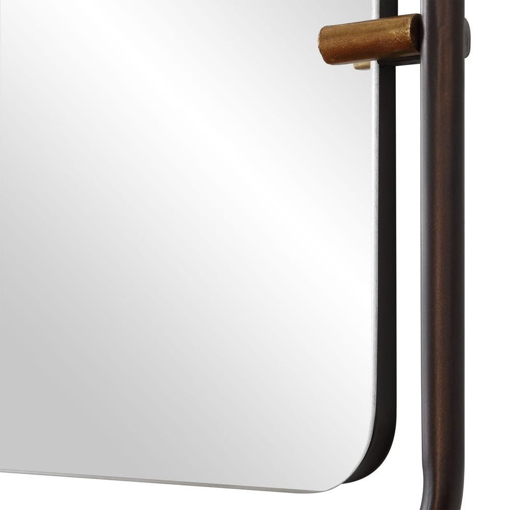 Close-up of a mirror with a wooden frame on a white background