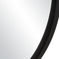 Close-up of a black curved mirror on a white background