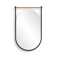 A modern wall mirror with a black metal frame and a horizontal wooden hanging rod, shown against a plain white background.