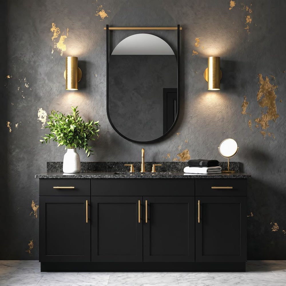 A modern bathroom vanity setup with a black double-sink cabinet, black marble countertop, gold-tone faucets and handles, a large rounded-arch wall mirror, two gold sconces, and a dark textured wall with gold leaf accents.