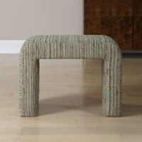 Textured stool on a wooden floor with a neutral background
