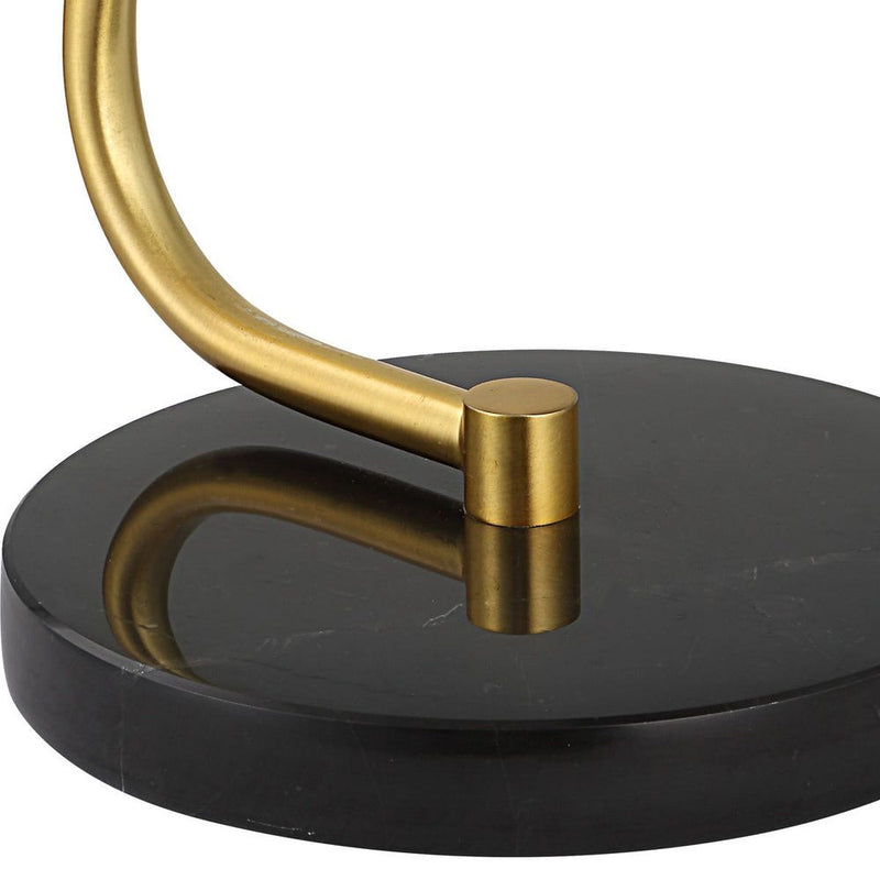 Uttermost Black + Gold Desk Lamp features a gold metal rod and black marble base for a stylish, modern accent.