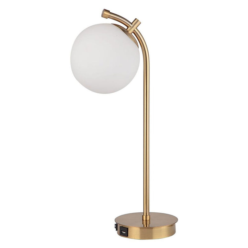 The Uttermost Glass Globe Desk Lamp features a white globe shade and USB port in its sleek brass base.