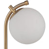 Uttermost Glass Globe Desk Lamp features an antique gold finish, curved arm, and round white glass globe shade.