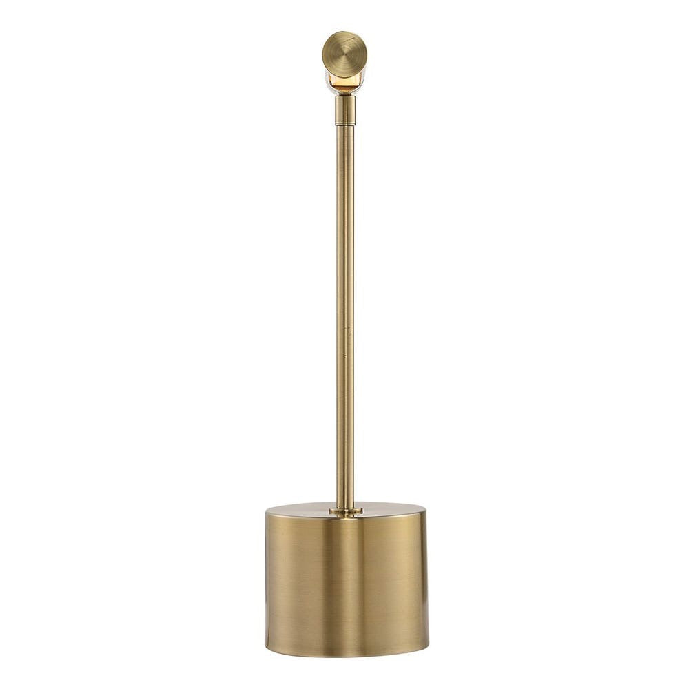 The Uttermost Antique Brass Desk Lamp features a sleek design, displayed against a clean white background.