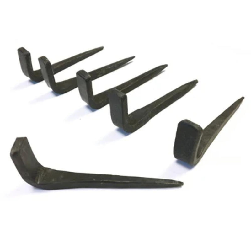 Set of black metal hooks on a white background