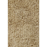 small fluffy beige pelt rug wool recycled cotton rounded edges