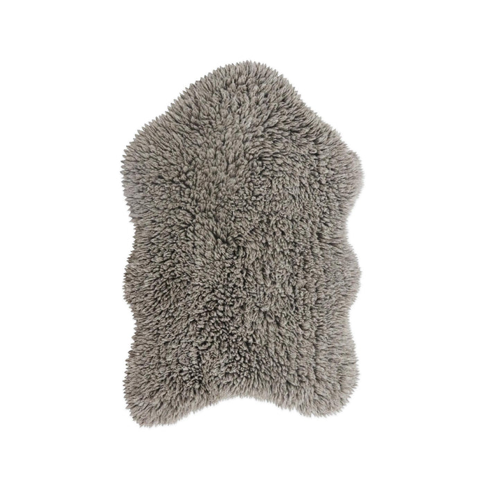 A gray shaggy sheepskin-style rug or throw with an irregular natural hide shape, shown against a plain white background.