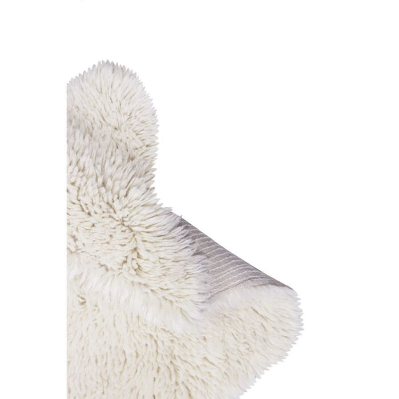 small fluffy white pelt rug wool recycled cotton rounded edges