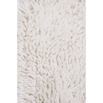 small fluffy white pelt rug wool recycled cotton rounded edges