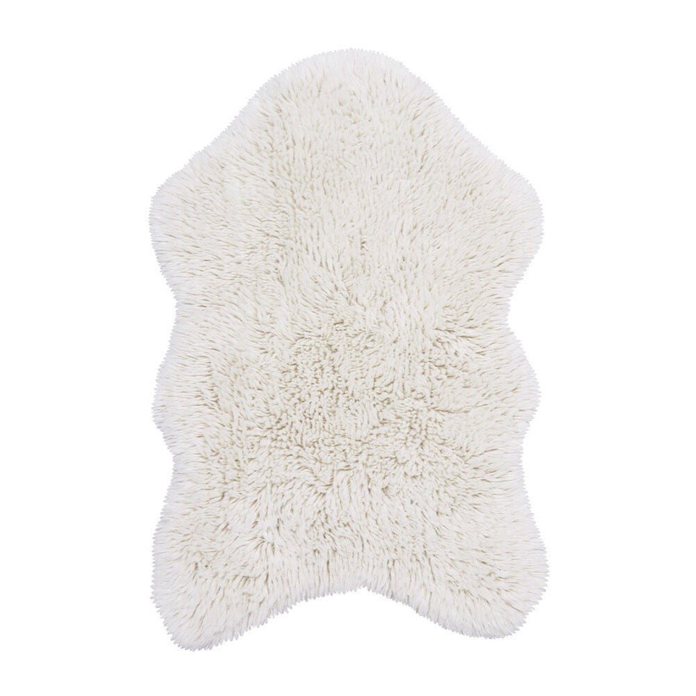 small fluffy white pelt rug wool recycled cotton rounded edges