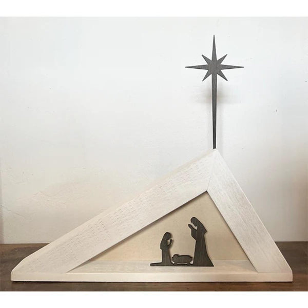 The Brayden & Brooks nativity scene is minimalist and crafted from reclaimed wood with a star framed by a white triangle.