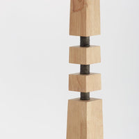 floor lamp spaced light wood block black iron natural linen shade