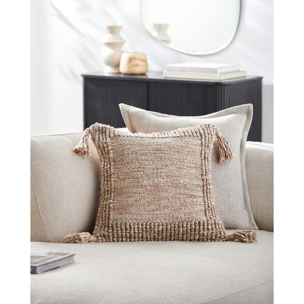 square tan textured outdoor pillow tassels