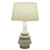 off-white striated ceramic table lamp turned silhouette white linen shade