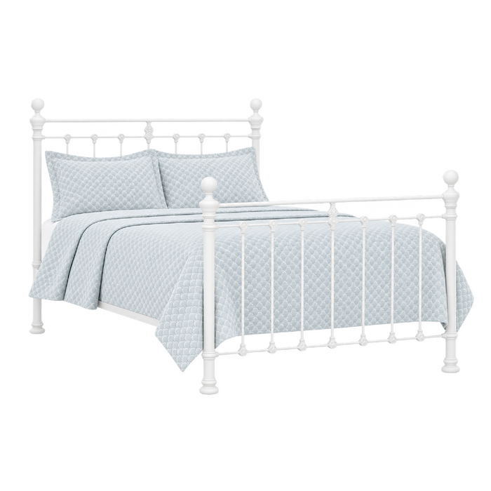 Orchids Lux Home Castile White Metal Bed, wood slats, light blue quilted bedding, 2 pillows & blanket shown.