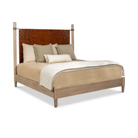 Sarreid, Ltd. Vineyards King Bed with woven leather headboard, beige bedding, and tan pillows on white background.
