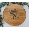The Bourbon Head Lazy Susan Tray by Sono Inspired features a crafted design from repurposed materials, showcasing stamped text encircled by green leaves.