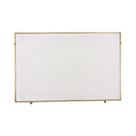 An antique brass fireplace screen by Arteriors with a straightforward, thin frame in a vintage style.