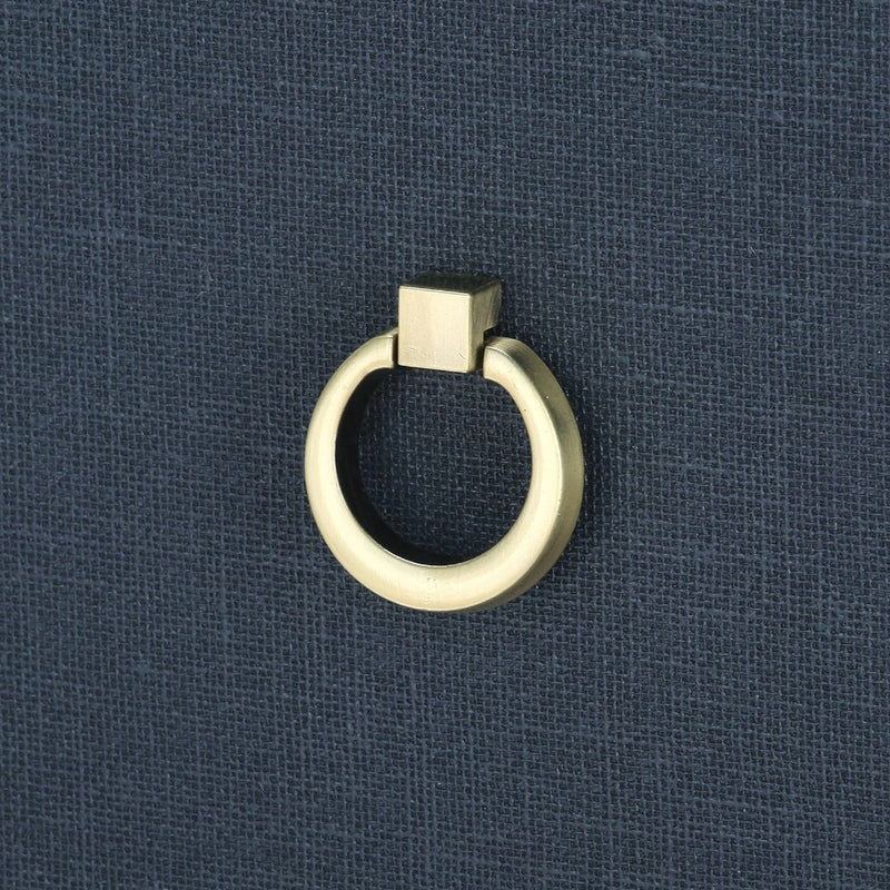 blue linen 3 drawer side table brass pulls