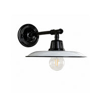 Black wall-mounted light fixture with a white shade on a white background