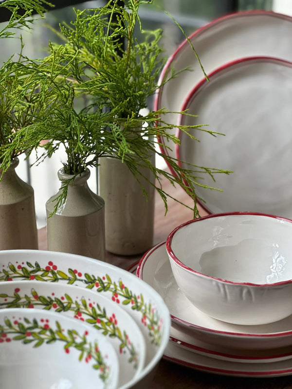 place setting of melamine medium christmas wreath bowl red green set of 3 and red rimmed white bowl plate sets