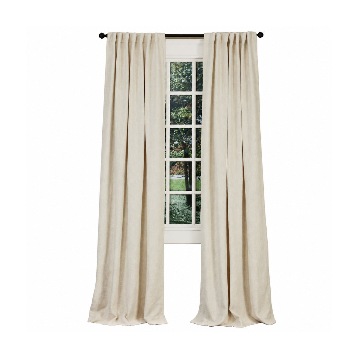 Emdee International Boucle Ivory Cotton Curtain Panel on a black rod frames a window with outdoor greenery views.