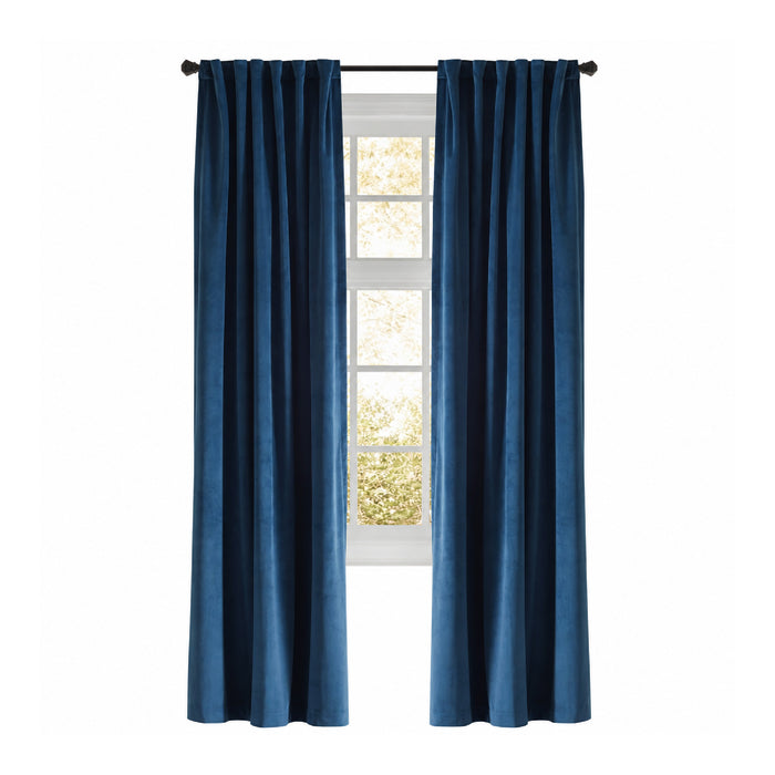Sunlight and trees shine through an Emdee International Camden Navy Velvet Curtain Panel, gently parted at the window.