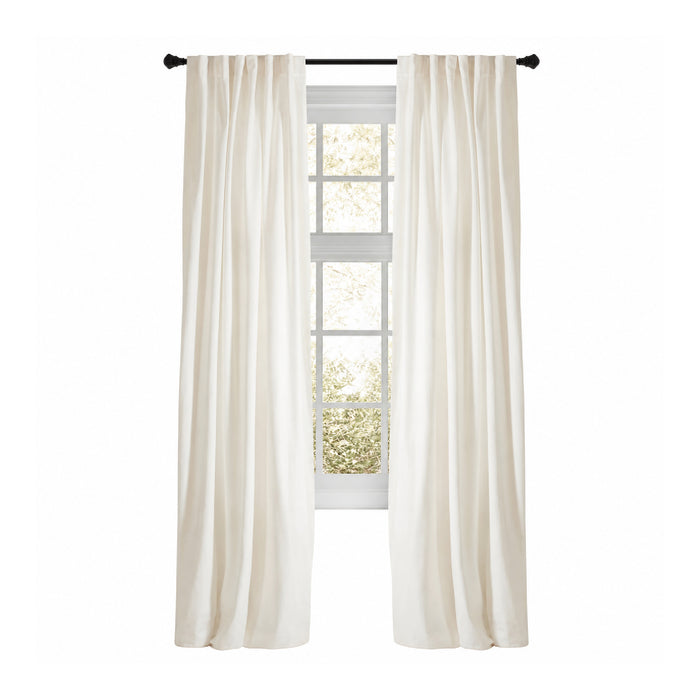 Camden White Velvet Curtain Panels by Emdee International hang on a black rod, creating an airy, elegant look.