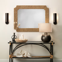 Black console table with decor, Jamie Young Two Handled Kettle Table Lamp, and candles under mirror and wall sconces.
