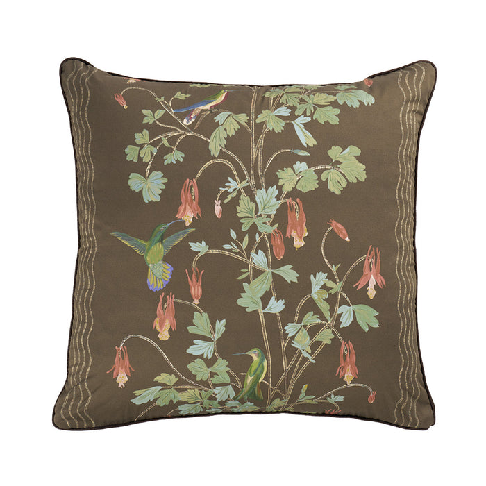 A square decorative throw pillow featuring a detailed botanical and bird pattern on a dark brown background. The design includes green leaves, hanging dusty pink flowers, and two hummingbirds in green and blue.