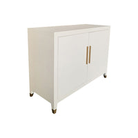 off-white raffia wrapped 2-door cupboard interior shelf brass hardware