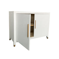 off-white raffia wrapped 2-door cupboard interior shelf brass hardware