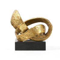 abstract gold leaf statue metal black marble base