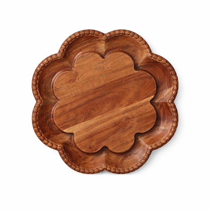 Wooden tray with decorative edge on a white background