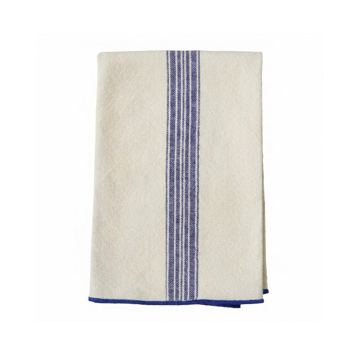 Off white cloth napkin with blue stripes on a white background