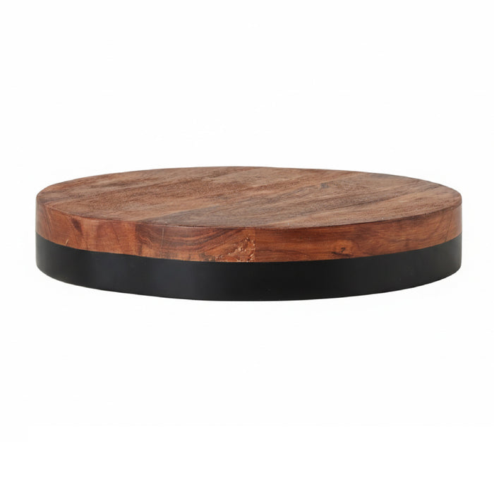 Wooden round cutting board with black base on a white background