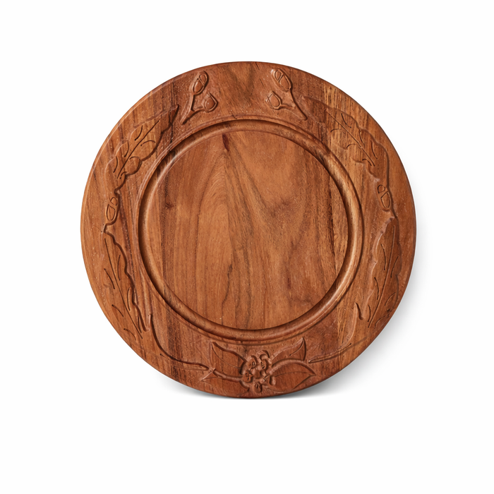 Round wooden board with engraved design on a white background