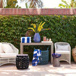 outdoor concrete gray console table chairs lifestyle