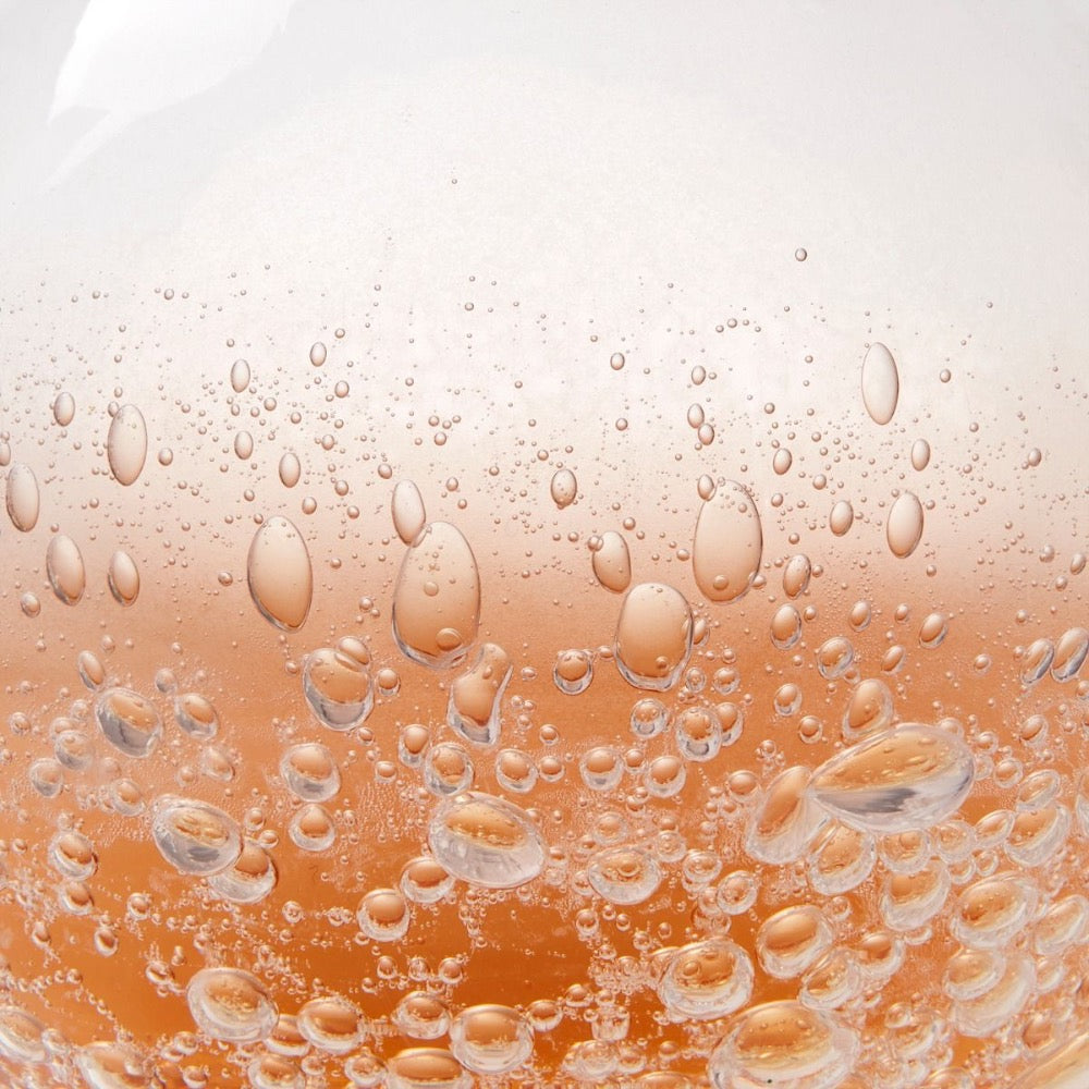 peach clear hand-blown glass round bulb vase