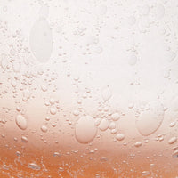 peach clear hand-blown glass round bulb vase