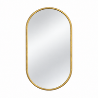 Varina Oval Wall Mirror - Gold Leaf, a minimalistic oval wall mirror with a textured antique gold frame.