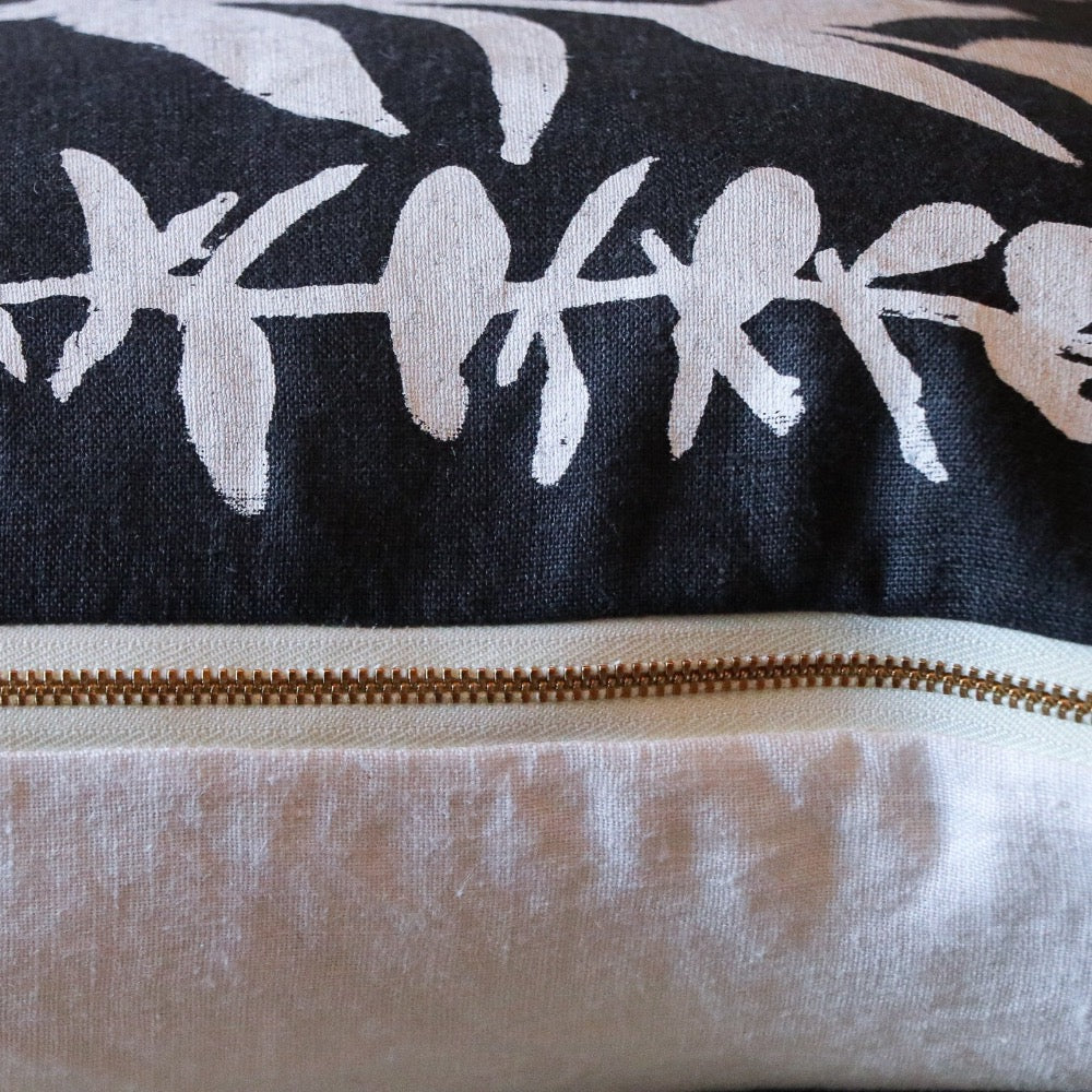 square pillow gray linen white eucalyptus branches 
