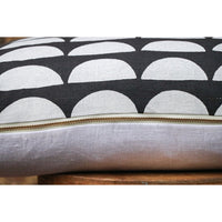 dark gray lumbar pillow white half moons