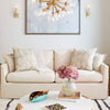 cream slipcovered small 2 cushion sofa